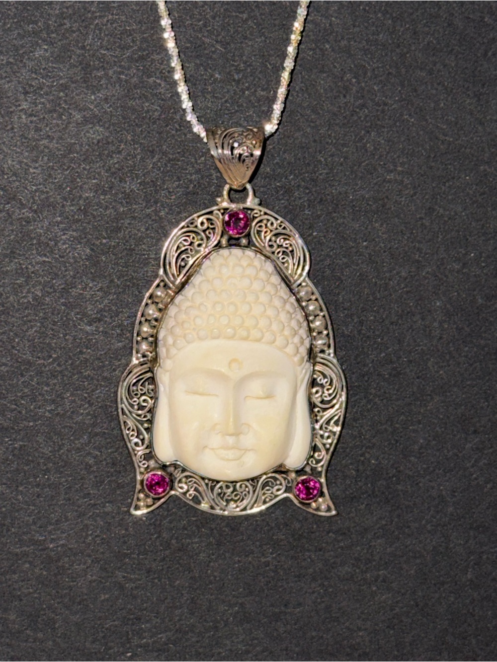 Buddha Carved Pendant Necklace in Ivory-colored Plastic and Magenta Gem Accents